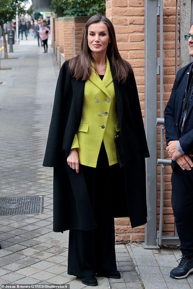 Queen Letizia of Spain is all smiles in placing chartreuse blazer from Hugo Boss for assembly in Madrid